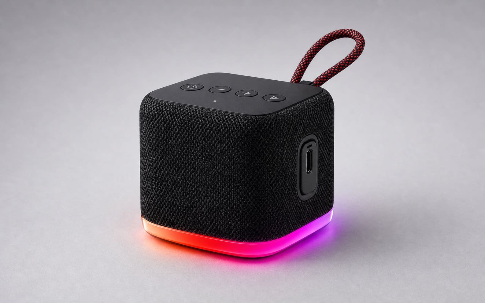 Unbranded compact cube Bluetooth speaker with RGB lighting