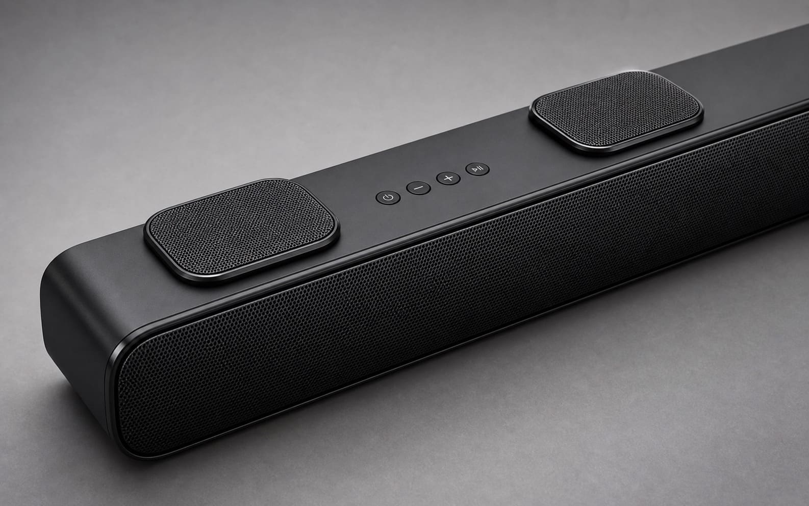 Unbranded soundbar with top-firing driver grilles